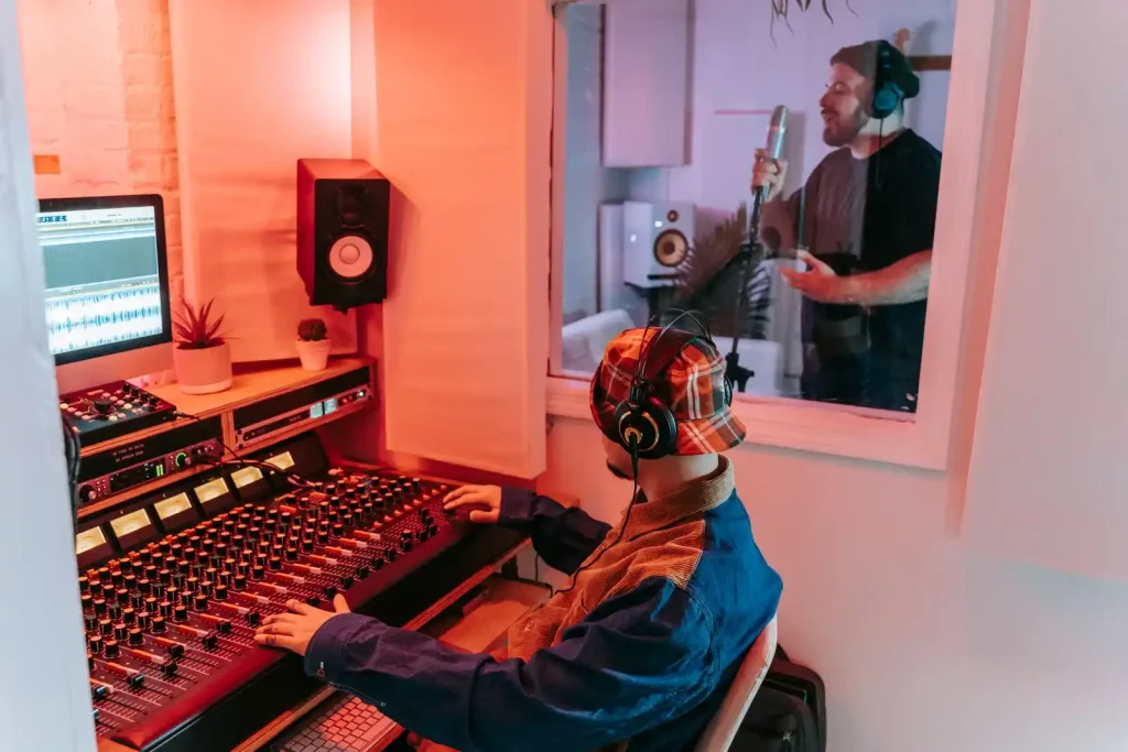 Expert applying acoustic treatment to walls