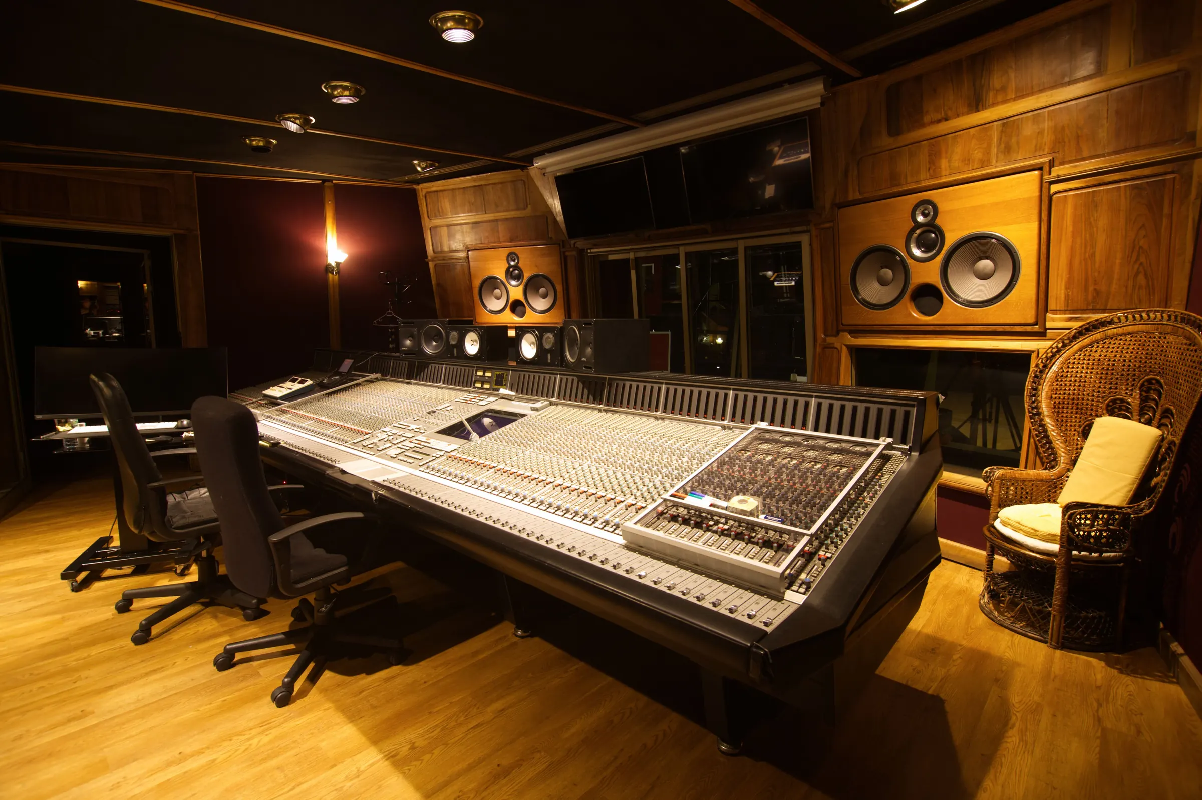 Acoustically treated studio control room with mixing console – Sound Krafted